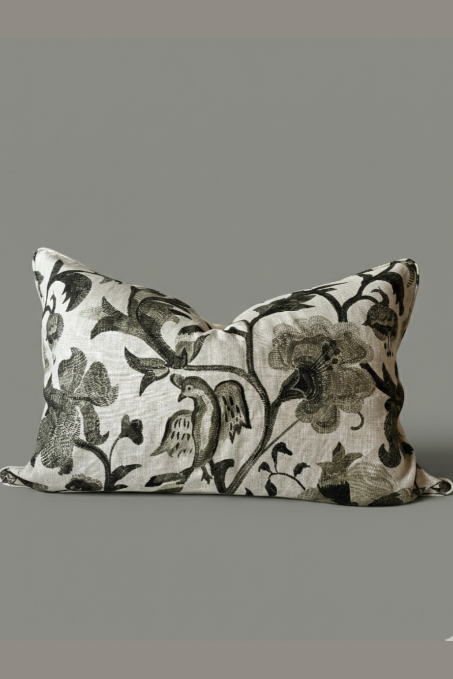 Extra Long Decorative pillow with floral pattern on a gray background